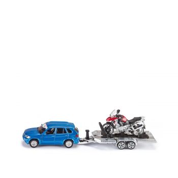 Car with trailer and motorbike