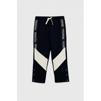 Sisley pantaloni de trening pentru copii culoarea albastru marin