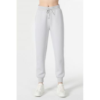 Pantaloni sport cu croiala conica si snur de ajustare