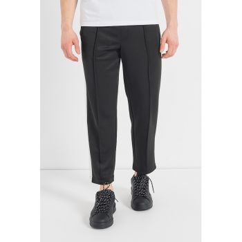 Pantaloni jogger conici