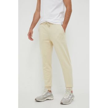 The North Face pantaloni de trening din bumbac culoarea bej, neted