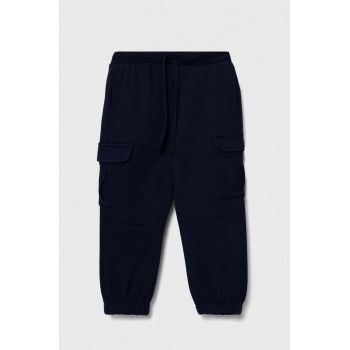 United Colors of Benetton pantaloni de trening din bumbac pentru copii culoarea albastru marin, neted