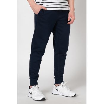 Pantaloni sport conici cu buzunare oblice