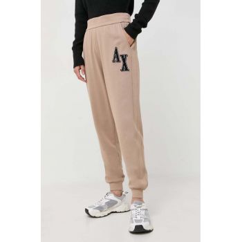 Armani Exchange pantaloni de trening culoarea bej, cu imprimeu