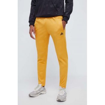 adidas pantaloni de trening culoarea galben, modelator