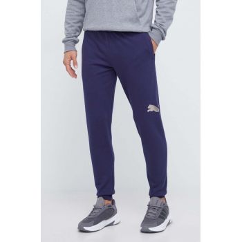 Puma pantaloni de trening culoarea albastru marin, neted