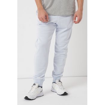 Pantaloni sport conici cu buzunare laterale Sportswear Club