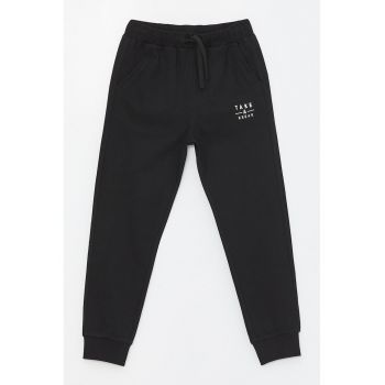 Pantaloni de trening cu buzunare oblice