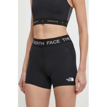 The North Face pantaloni scurti sport Tech Bootie femei, culoarea negru, cu imprimeu, medium waist, NF0A87JZJK31 ieftini