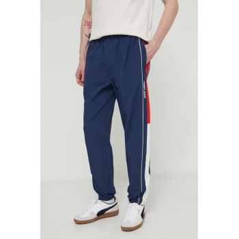 Tommy Jeans pantaloni de trening Archive Games culoarea bleumarin, cu model, DM0DM19539