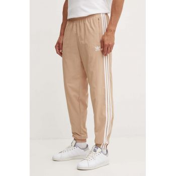 adidas Originals pantaloni de trening culoarea bej, cu imprimeu, IZ2417