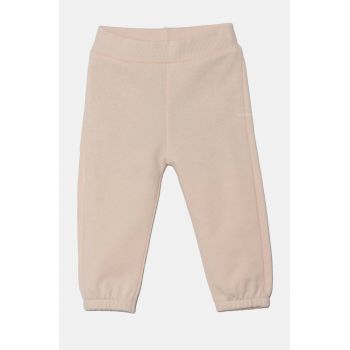 United Colors of Benetton pantaloni de trening din bumbac pentru bebeluși culoarea portocaliu, cu imprimeu, 3J70AF01T