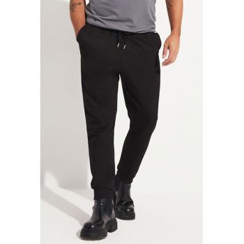 Pantaloni de trening cu buzunare oblice