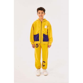 Bobo Choses pantaloni de trening din bumbac pentru copii culoarea galben, cu imprimeu, 224AC076