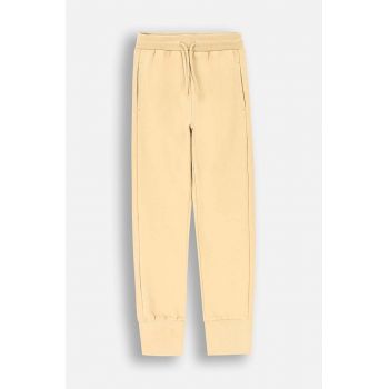 Coccodrillo pantaloni de trening din bumbac pentru copii culoarea bej, neted, EVERYDAY GIRL