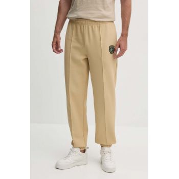 Lacoste pantaloni de trening culoarea bej, neted