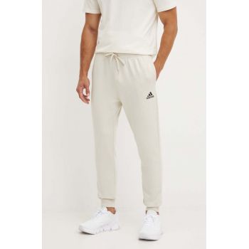 adidas pantaloni de trening Essentials culoarea bej, neted, JH1039