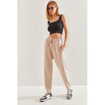 Pantaloni de trening cu buzunare oblice