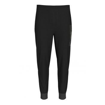 Pantaloni conici de trening