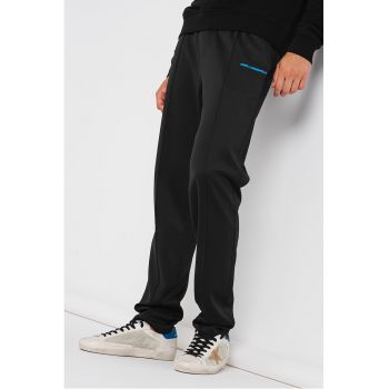 Pantaloni de trening cu buzunare laterale