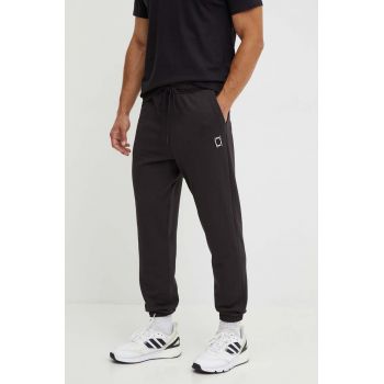 Puma pantaloni de trening din bumbac culoarea negru, neted, 627595