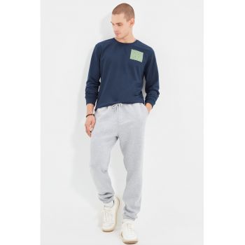 Pantaloni sport cu buzunare oblice