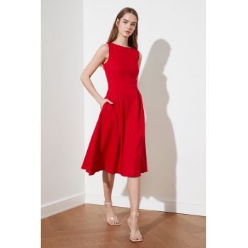 Rochie midi evazata cu buzunare laterale