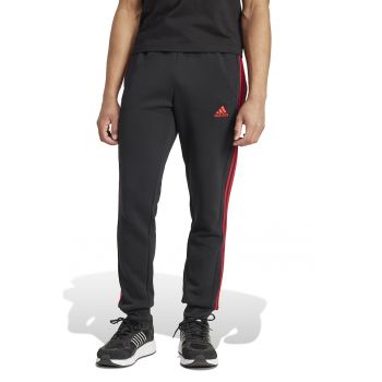 Pantaloni de trening conici cu buzunare laterale