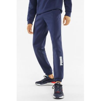 Pantaloni sport conici cu detaliu logo