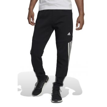 Pantaloni sport cu buzunare cu fermoar