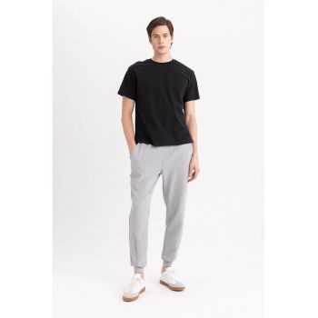 Pantaloni de trening cu buzunare oblice