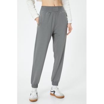 Pantaloni de trening cu model uni si banda lata in talie