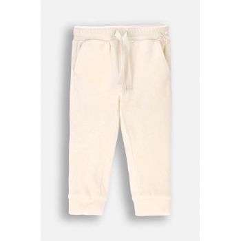 Coccodrillo pantaloni de trening pentru copii culoarea bej, neted, CUTE GIRL NEWBORN