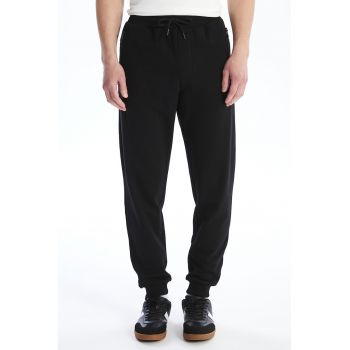 Pantaloni de trening slim fit cu buzunare cu fermoar