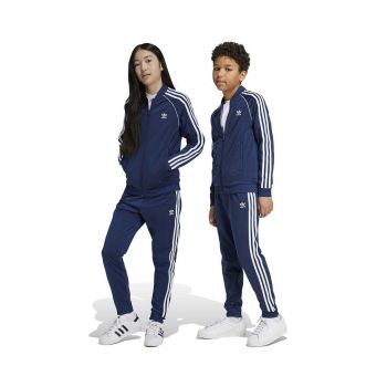 adidas Originals pantaloni de trening pentru copii SST TRACK PANTS culoarea albastru marin, cu imprimeu, IY7466