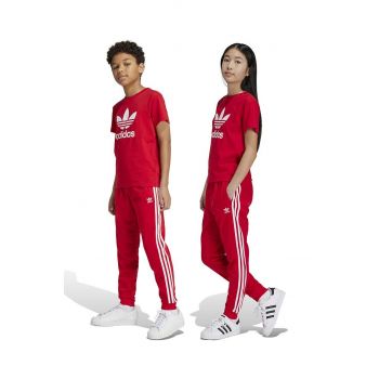 adidas Originals pantaloni de trening pentru copii SST TRACK PANTS culoarea rosu, cu imprimeu, IX7631