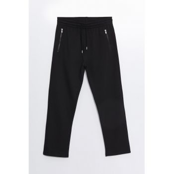 Pantaloni de trening cu buzunare cu fermoar