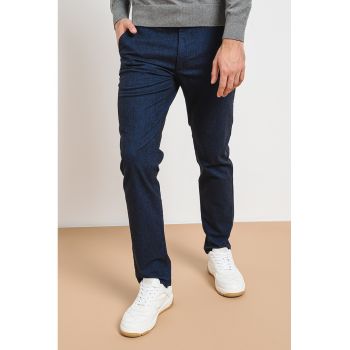 Pantaloni slim fit cu buzunare