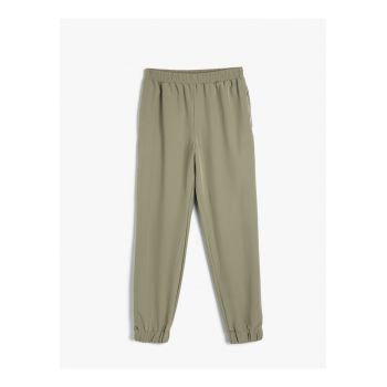 Pantaloni regular fit cu buzunare cu fermoar