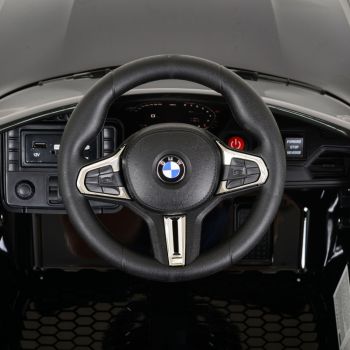 Masinuta electrica 12V cu echipare premium ,deschidere usi si licenta BMW M4 Painted Black