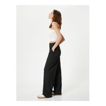 Pantaloni eleganti cu croiala ampla