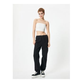 Pantaloni relaxed fit cu banda elastica in talie