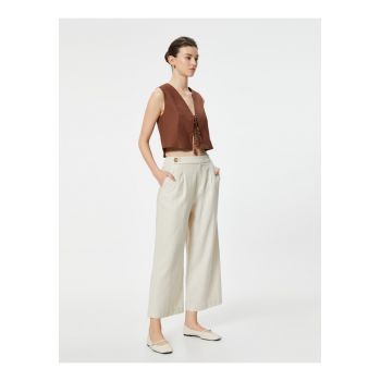 Pantaloni crop din amestec de in cu croiala ampla