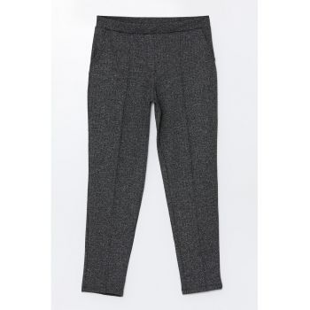 Pantaloni conici cu buzunare laterale