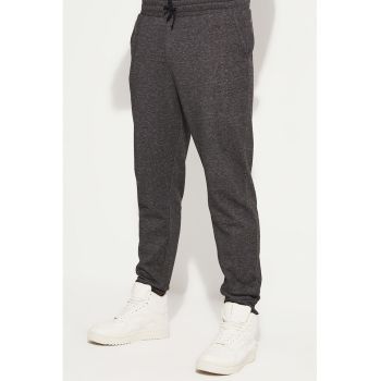 Pantaloni de trening din amestec de bumbac cu model uni