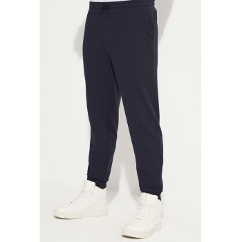 Pantaloni de trening din amestec de bumbac cu model uni