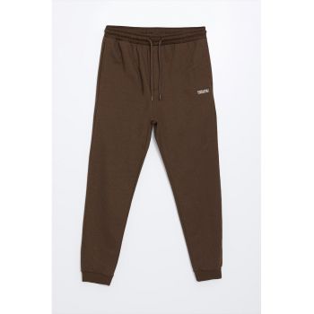 Pantaloni de trening cu buzunare laterale