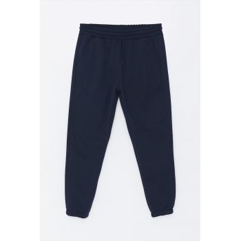 Pantaloni de trening cu buzunare oblice