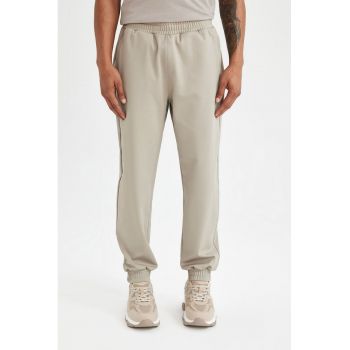 Pantaloni de trening cu buzunare laterale