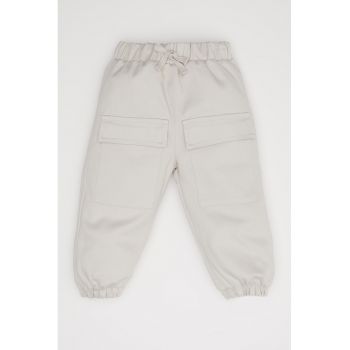 Pantaloni de bumbac cu buzunare cu clapa